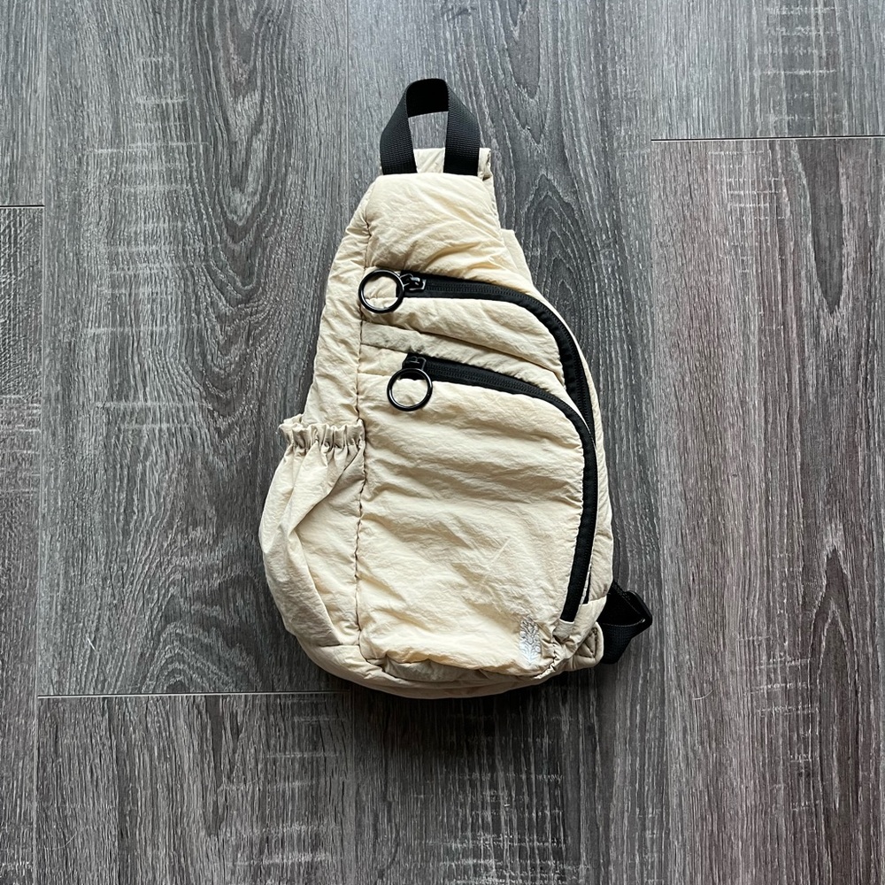 FP Movement Cream and Black Belt Bag Asymmetrical Design